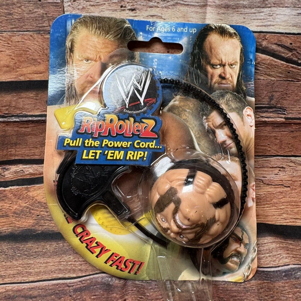 WWE RipRollerz Triple H "The Game" Action Figure Pull Cord Spinning Ball Toy NIP